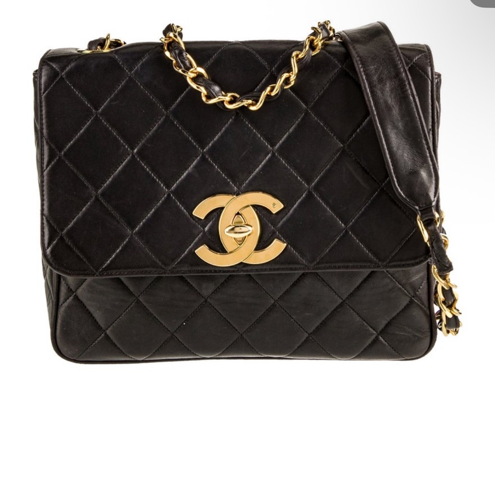 CHANEL Black Leather Shoulder Bag with Gold Accents